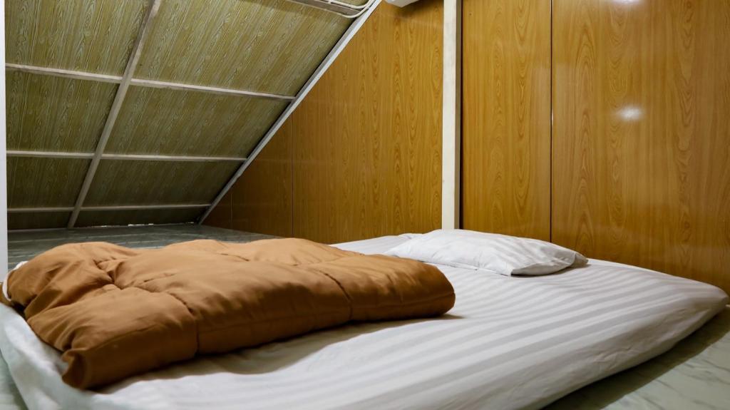 Postel nebo postele na pokoji v ubytování Baan Airport