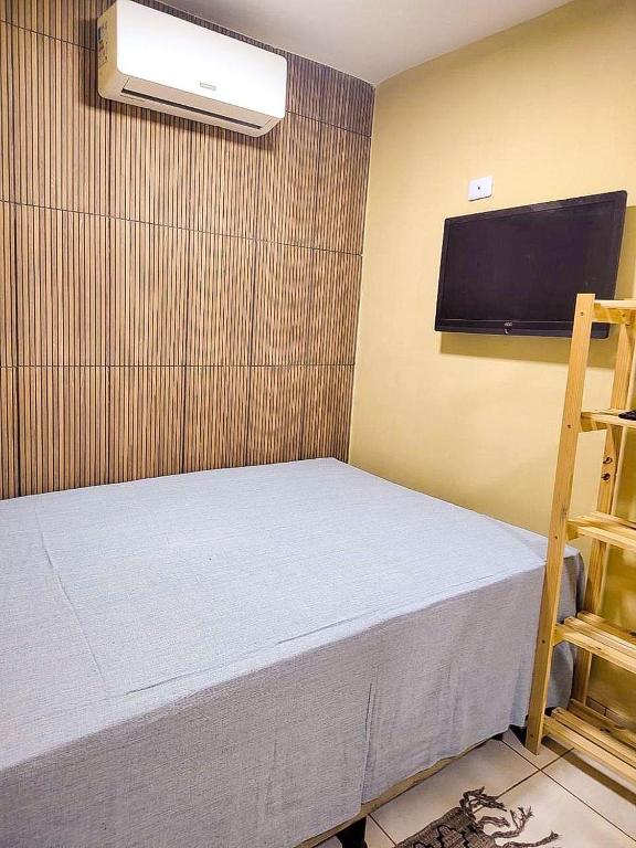 Postel nebo postele na pokoji v ubytování Chalé Pé de Serra