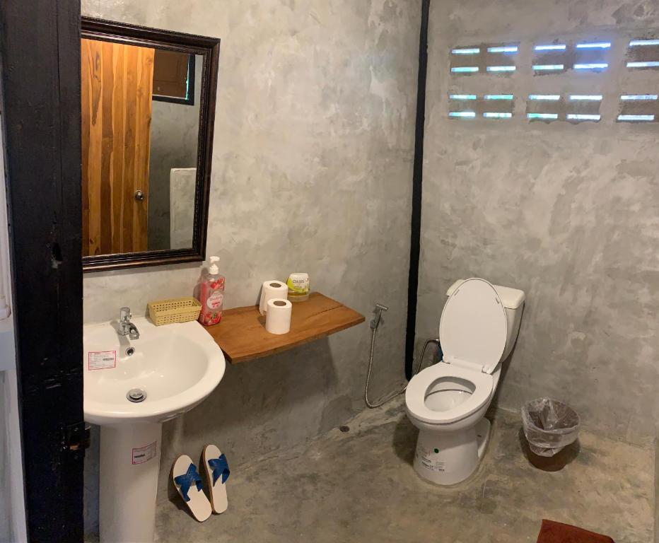 Koupelna v ubytování บ้านใจแปงโฮมสเตย์ Ban Jaipang Homestay