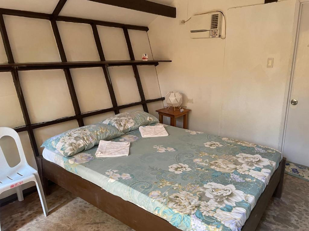 Postel nebo postele na pokoji v ubytování Popo isso homestay