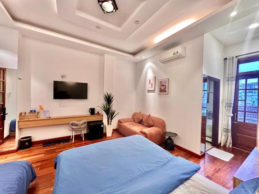 TV a/nebo společenská místnost v ubytování ChiPa Homestay