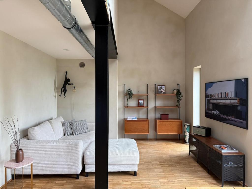 TV a/nebo společenská místnost v ubytování Villa auf der Klippe