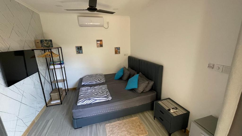 Postel nebo postele na pokoji v ubytování Grande Maldives Inn