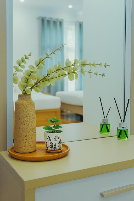 Postel nebo postele na pokoji v ubytování Cozy Vacation Home