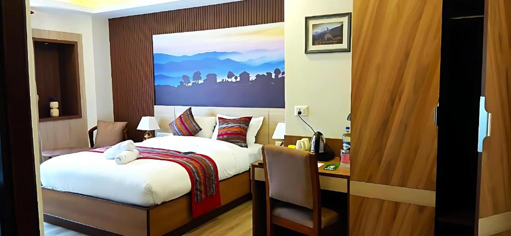 Postel nebo postele na pokoji v ubytování Hotel Sherpani