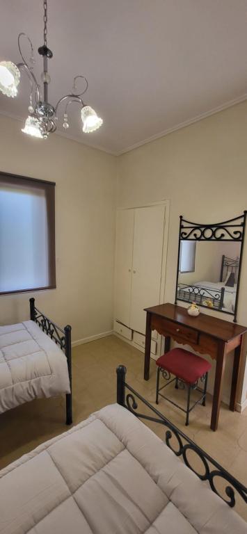 A bed or beds in a room at Margarita rooms