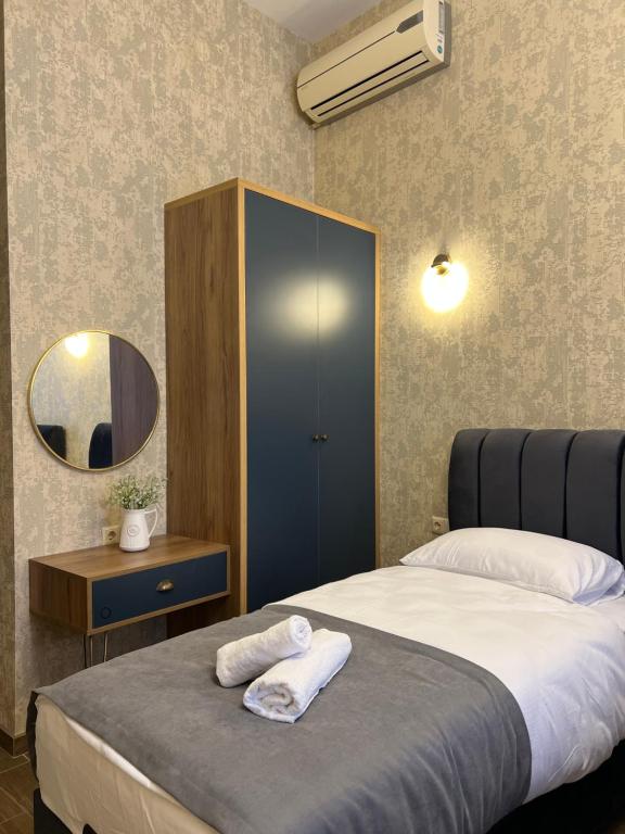 Postel nebo postele na pokoji v ubytování Albatross Luxe Hotel
