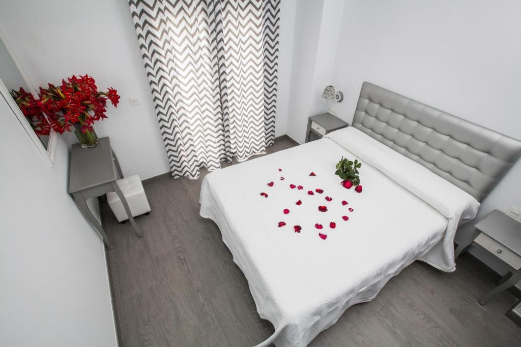 Postel nebo postele na pokoji v ubytování Hostal Boutique Bajamar
