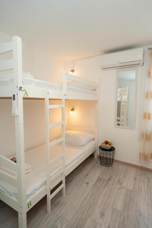 Postel nebo postele na pokoji v ubytování Hostel Novalis