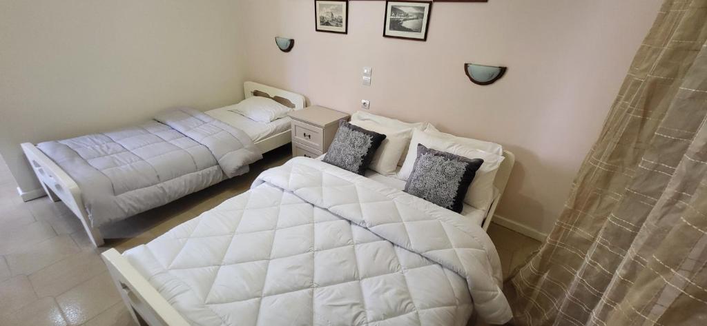 A bed or beds in a room at Margarita rooms