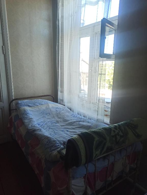 Postel nebo postele na pokoji v ubytování Akhalkalaki Hostel