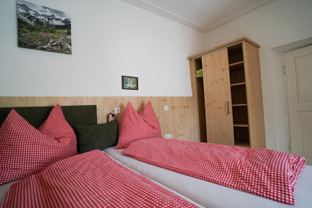 Postel nebo postele na pokoji v ubytování Penznhof