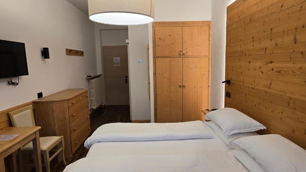 Postel nebo postele na pokoji v ubytování Lago Park Hotel
