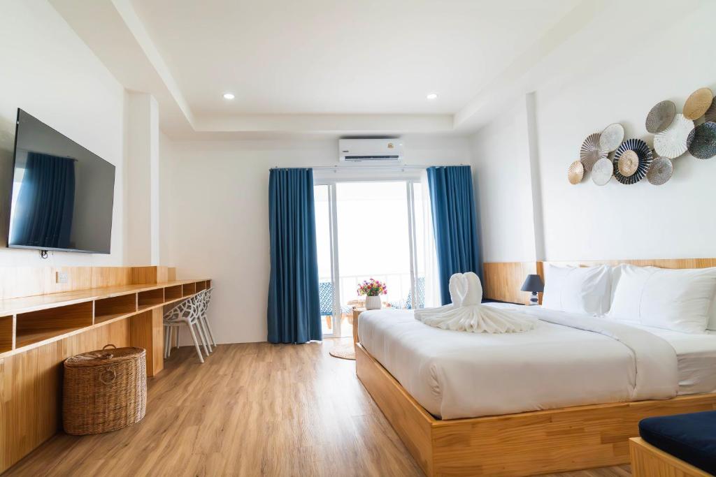 TV a/nebo společenská místnost v ubytování Ibiza Beach Club Koh Tao
