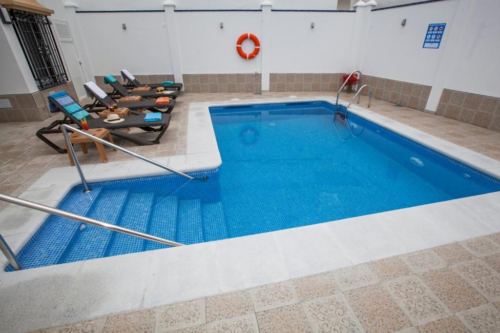 Bazén v ubytování Hostal Boutique Bajamar nebo v jeho okolí