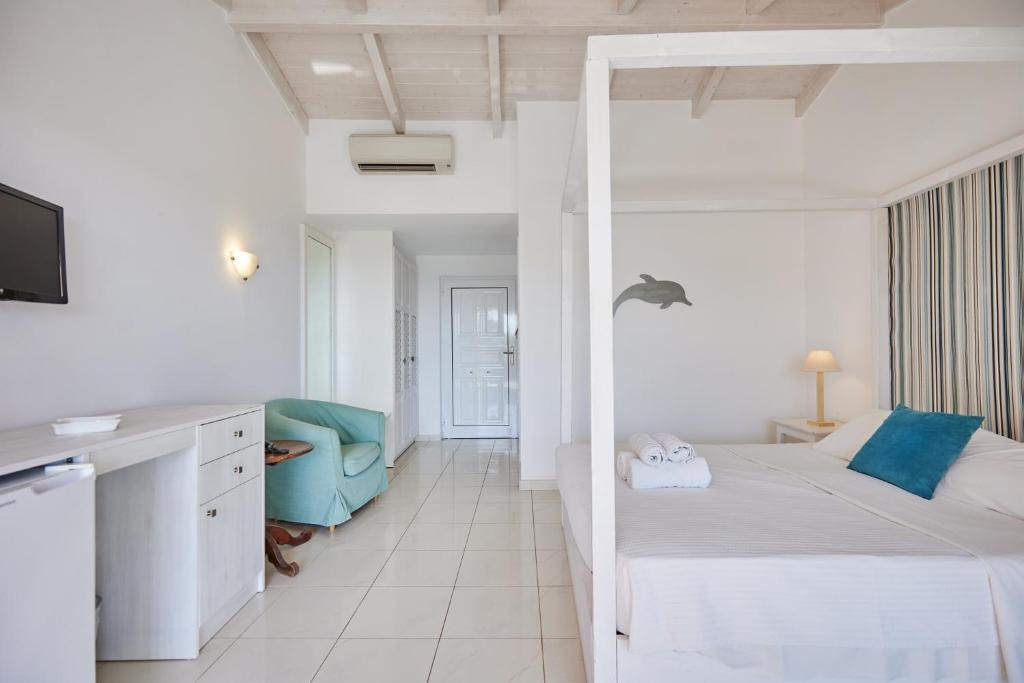 Postel nebo postele na pokoji v ubytování Gerakas Belvedere hotel