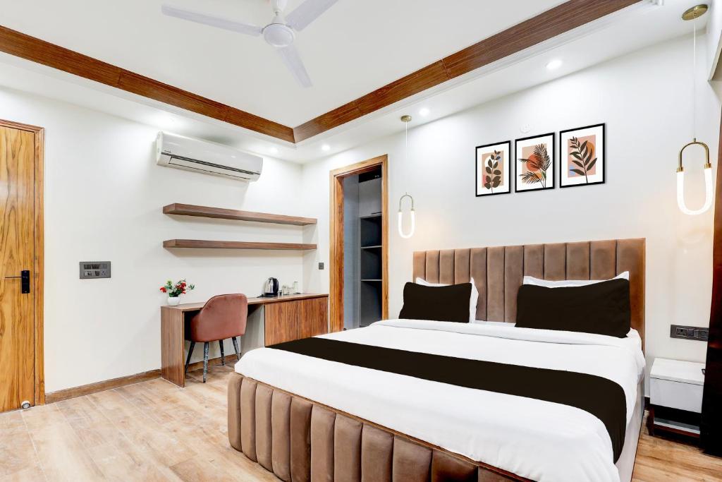 Postel nebo postele na pokoji v ubytování Super Hotel O Sector 43 Gurgaon