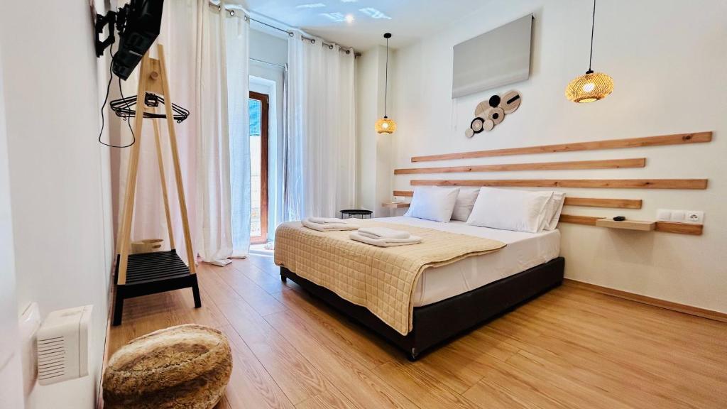 Postel nebo postele na pokoji v ubytování Eria's Junior Suite