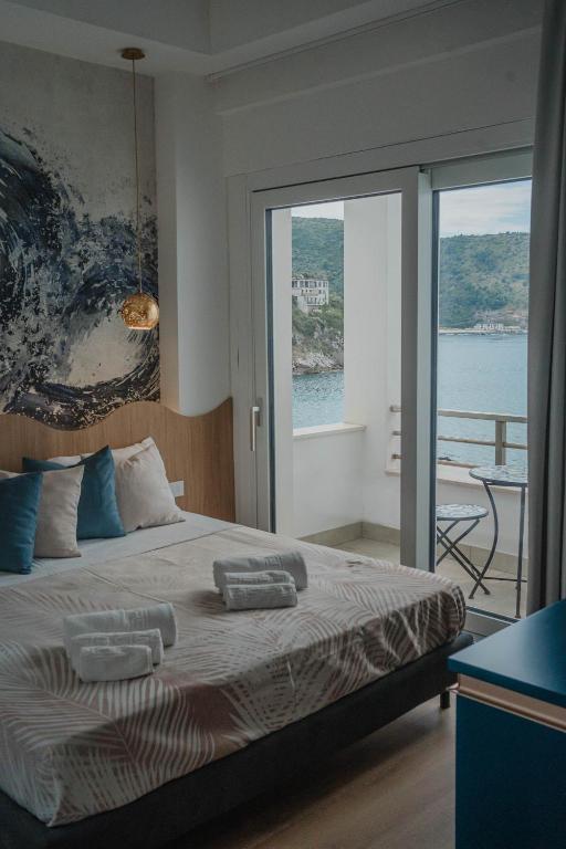 Postel nebo postele na pokoji v ubytování Hotel Ficocella