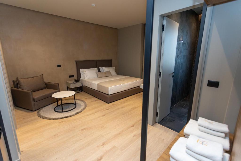 Postel nebo postele na pokoji v ubytování South Inn Hotel