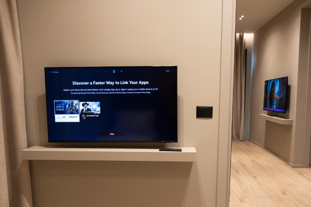 TV a/nebo společenská místnost v ubytování South Inn Hotel