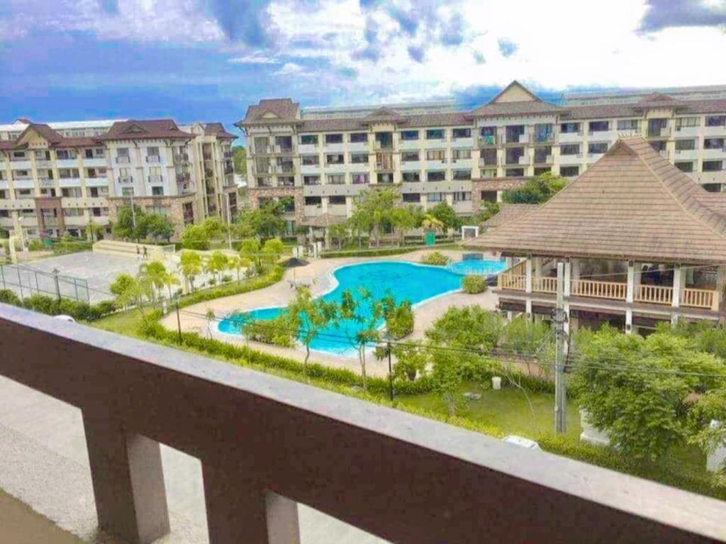 a view of the pool at a resort at Ecowest Condo beside SM Mall in Davao City