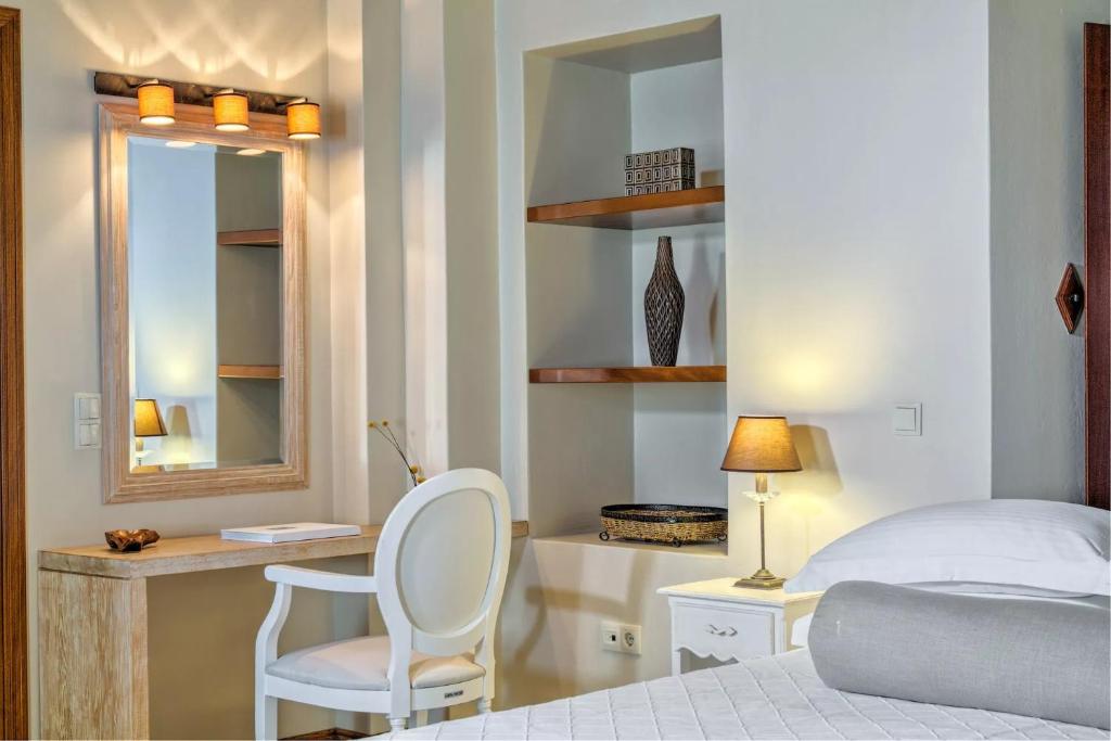 Postel nebo postele na pokoji v ubytování Mare Monte Luxury Suites