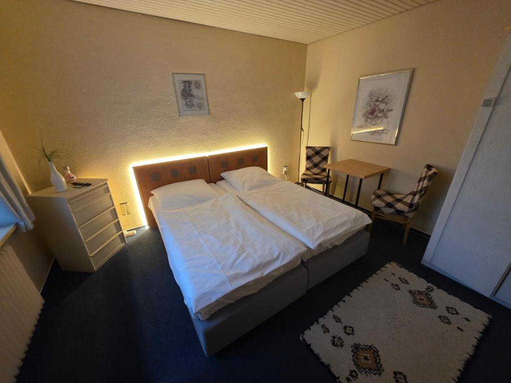 Postel nebo postele na pokoji v ubytování Pension Krohn