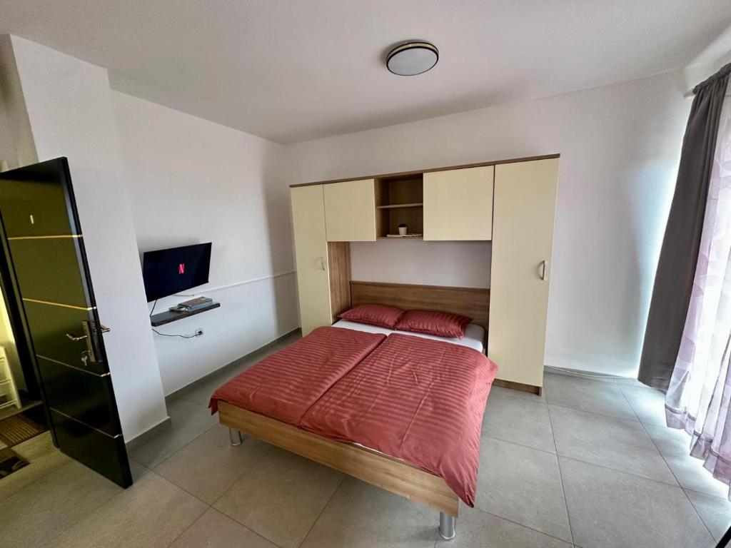 Posteľ alebo postele v izbe v ubytovaní Apartmani More Krk