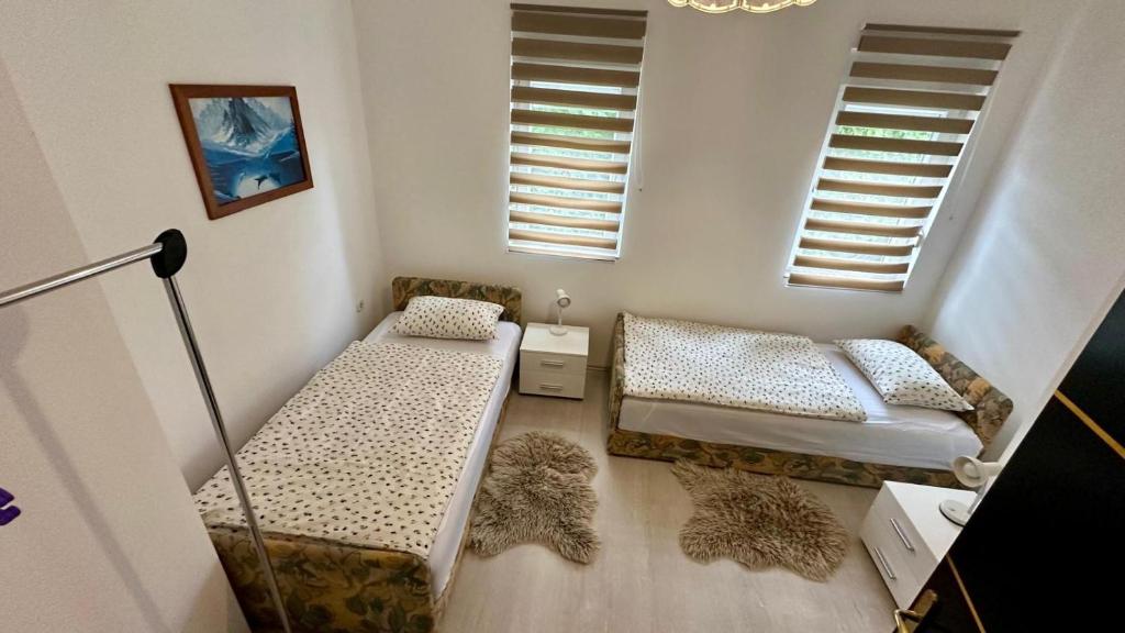 Posteľ alebo postele v izbe v ubytovaní Apartmani More Krk