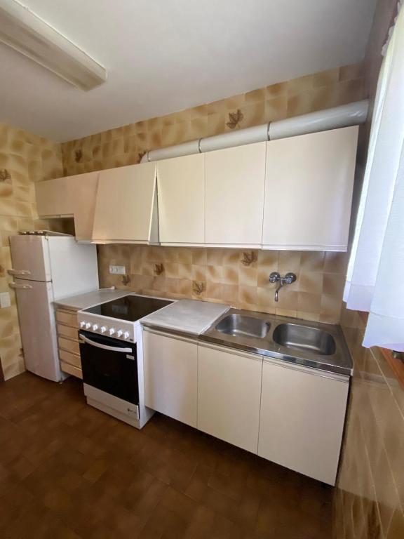 Kuchyň nebo kuchyňský kout v ubytování hotel vall fosca
