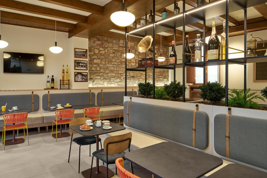 Un restaurante u otro lugar para comer en Hotel Antica Fonte
