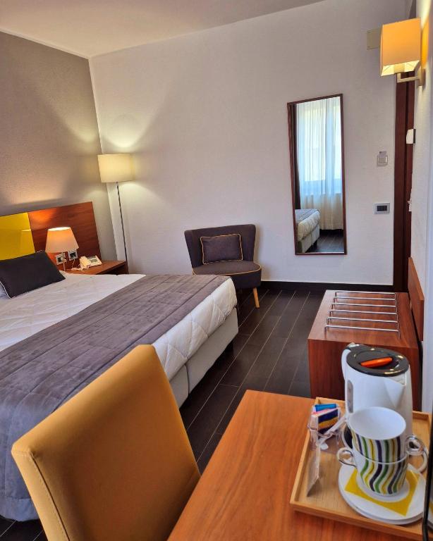 Postel nebo postele na pokoji v ubytování Hotel Sandalia