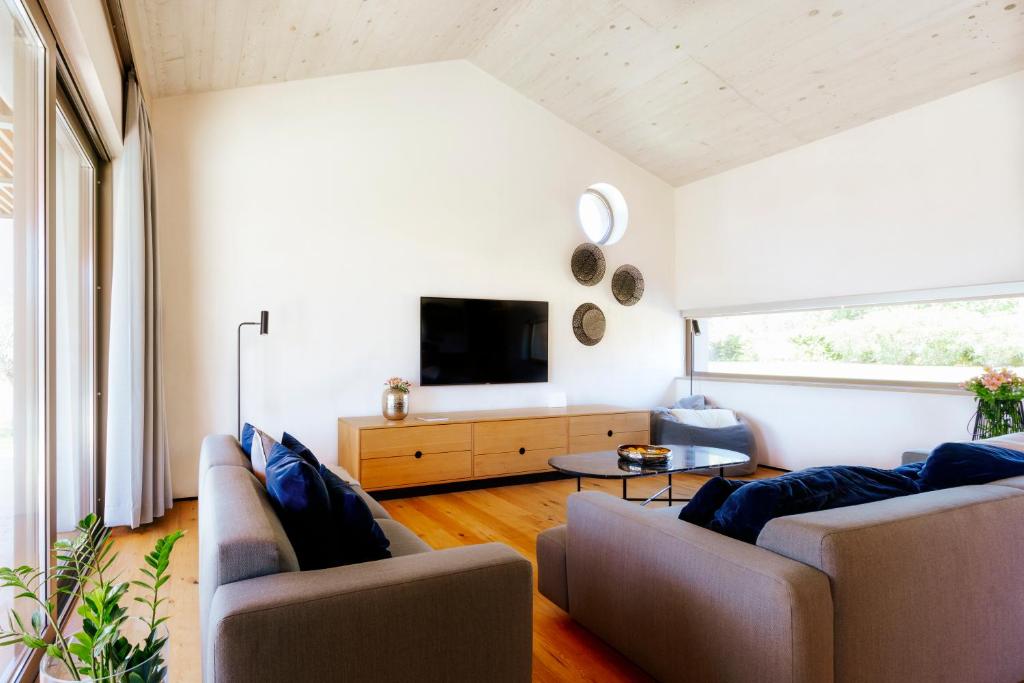 TV a/nebo společenská místnost v ubytování Villa Casa Ombra Rossa