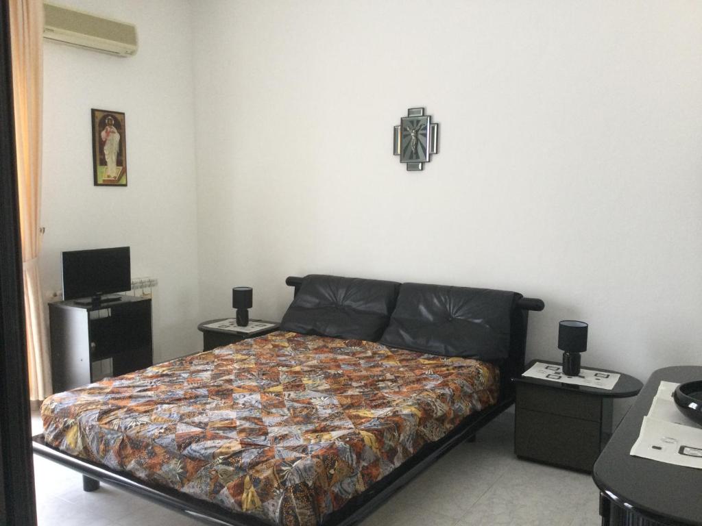 Postel nebo postele na pokoji v ubytování Elegante Appartamento Palermo