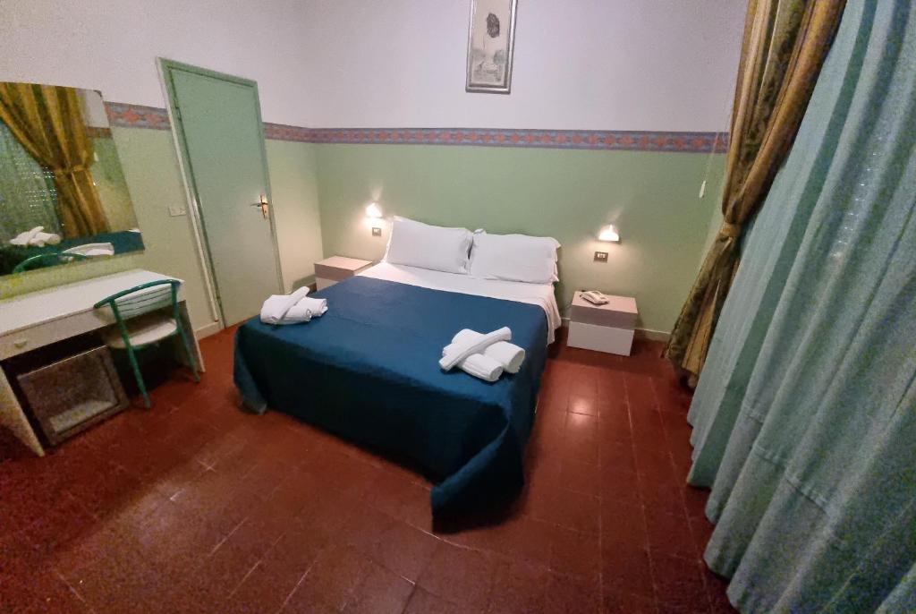 Postel nebo postele na pokoji v ubytování Hotel K2 Cervia 3 stelle sup