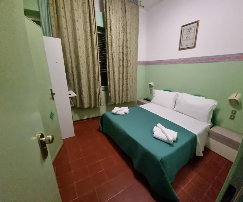 Postel nebo postele na pokoji v ubytování Hotel K2 Cervia 3 stelle sup