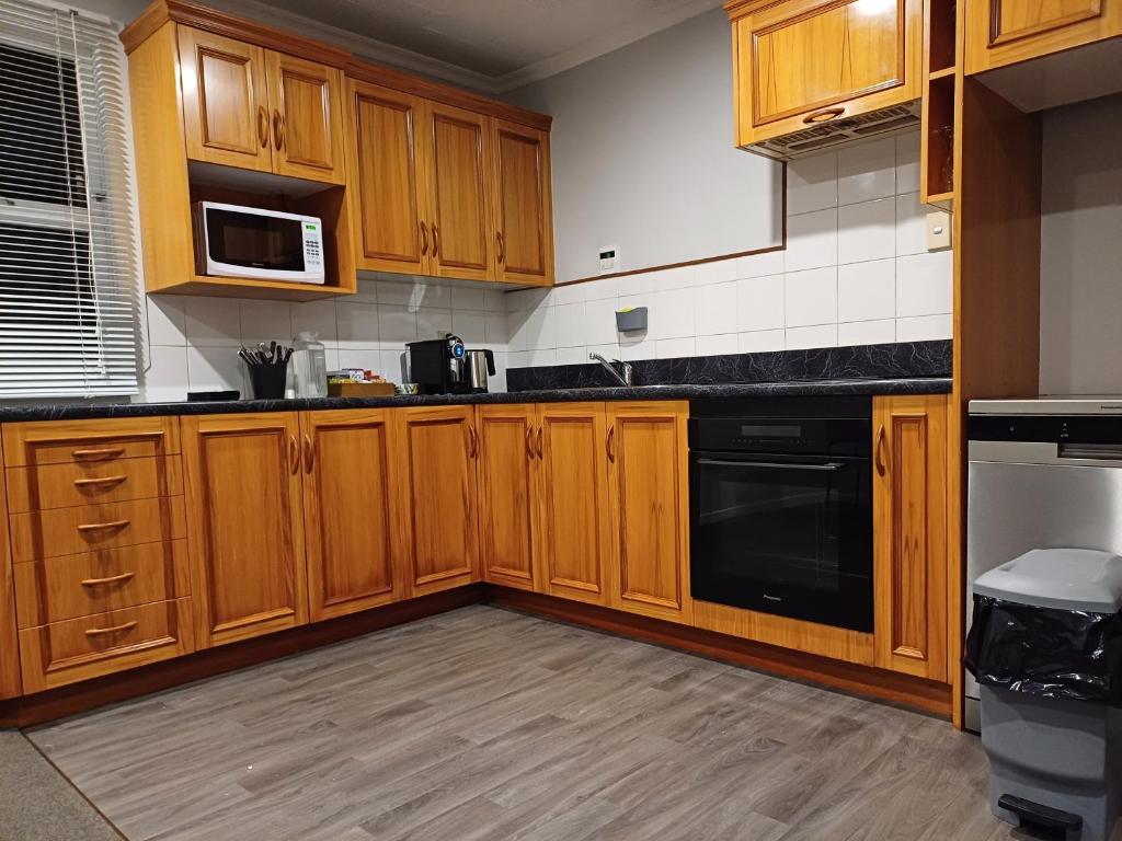 Kuchyň nebo kuchyňský kout v ubytování Richmond Villa