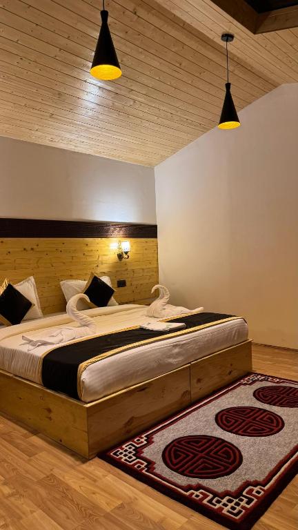 Postel nebo postele na pokoji v ubytování De Reeva Resort Pangong