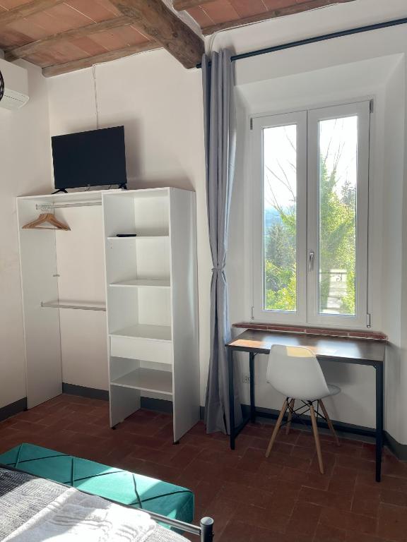 Postel nebo postele na pokoji v ubytování Chianti dreaming in Radda
