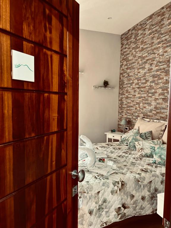 Letto o letti in una camera di Le Stanze di Megaride