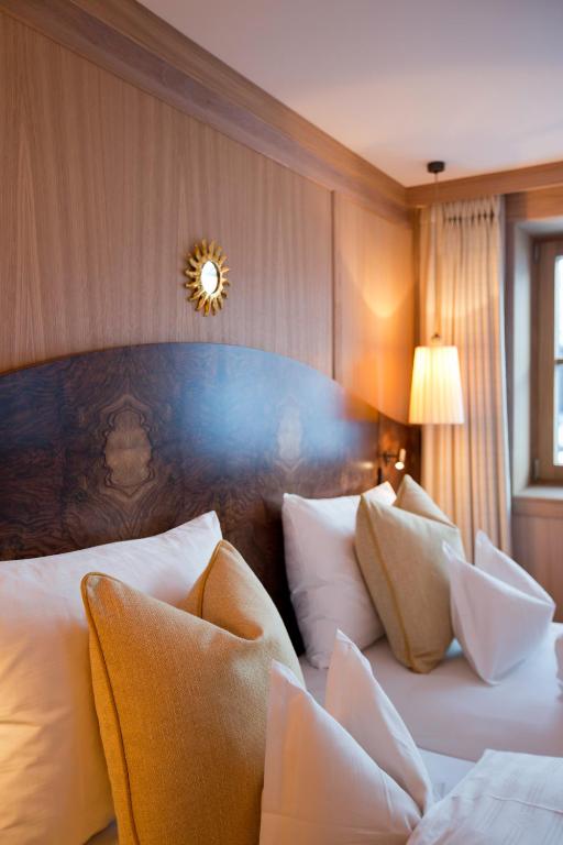 Postel nebo postele na pokoji v ubytování Hotel Sonnenburg