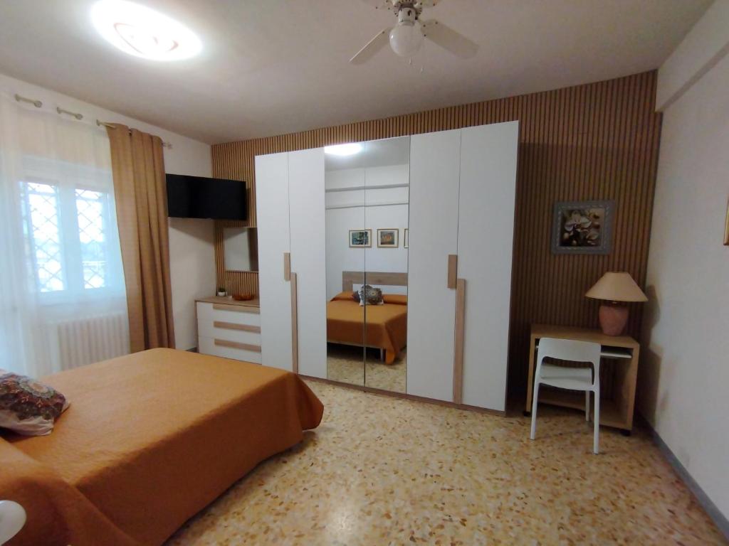 Ένα ή περισσότερα κρεβάτια σε δωμάτιο στο Il Melograno - Just like at home!