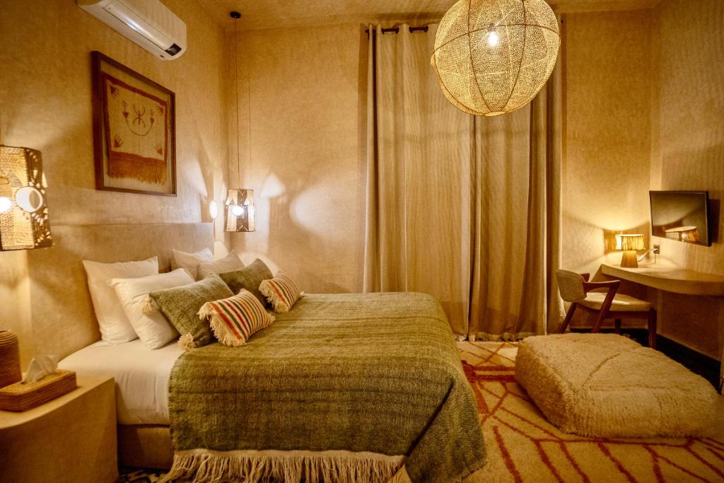 Postel nebo postele na pokoji v ubytování Zayyna hôtel de charme Essaouira