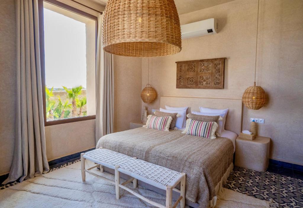 Postel nebo postele na pokoji v ubytování Zayyna hôtel de charme Essaouira