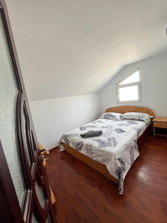 Postel nebo postele na pokoji v ubytování Vila Aron