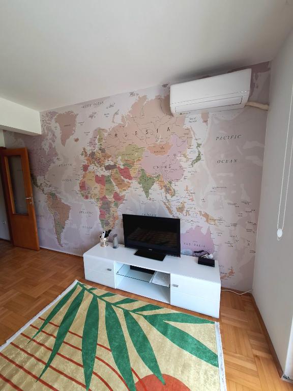 TV a/nebo společenská místnost v ubytování Apartment Lake story