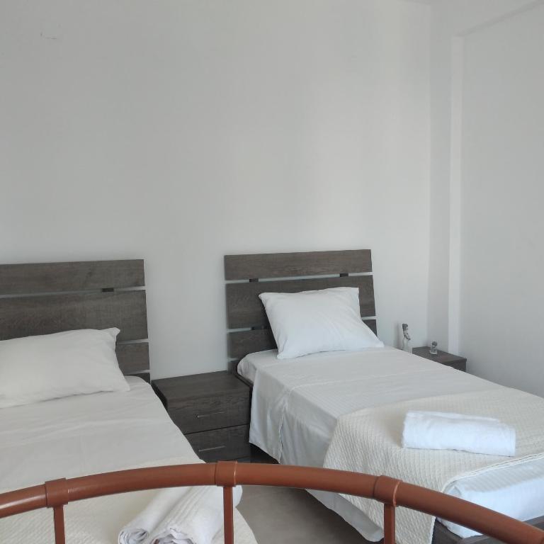 Postel nebo postele na pokoji v ubytování Kellis House