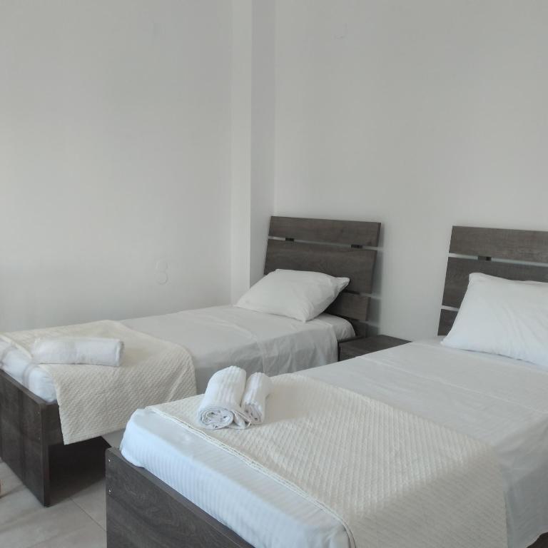 Postel nebo postele na pokoji v ubytování Kellis House