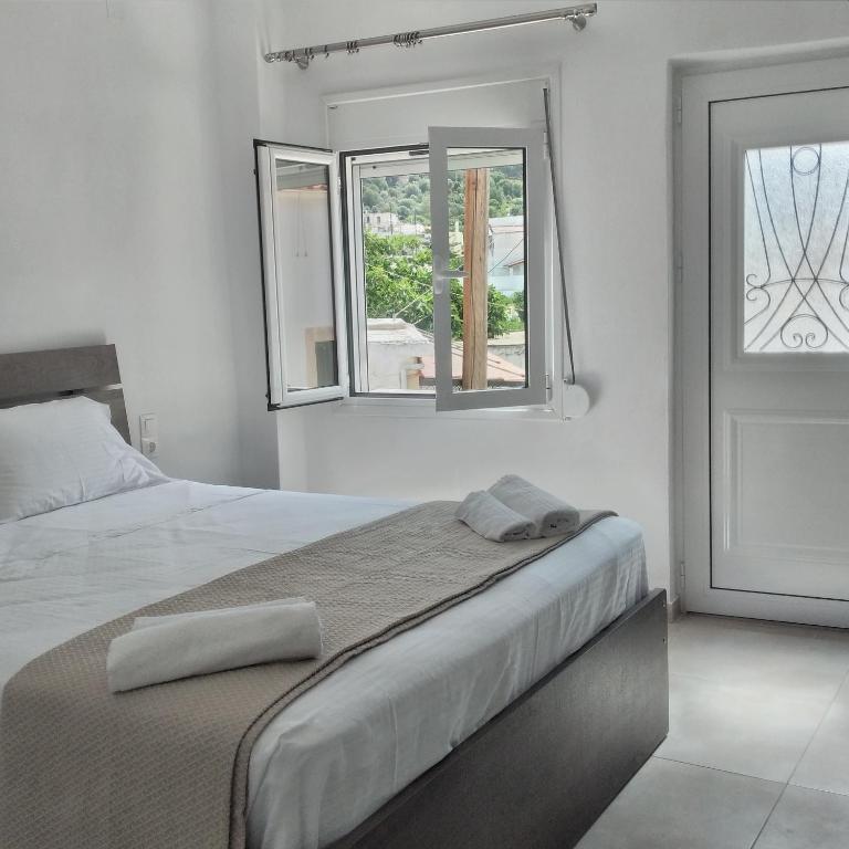 Postel nebo postele na pokoji v ubytování Kellis House